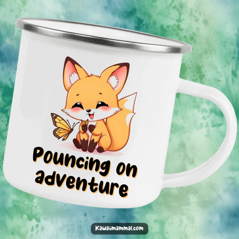 Funny camping mug showing a happy fox playfully pouncing towards a butterfly, ready for outdoor fun.