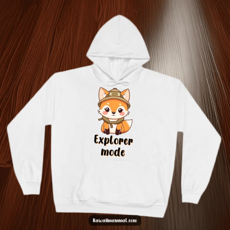 Funny hoodie with a kawaii fox in an explorer hat, curiously peering, offering cozy comfort for any adventure.