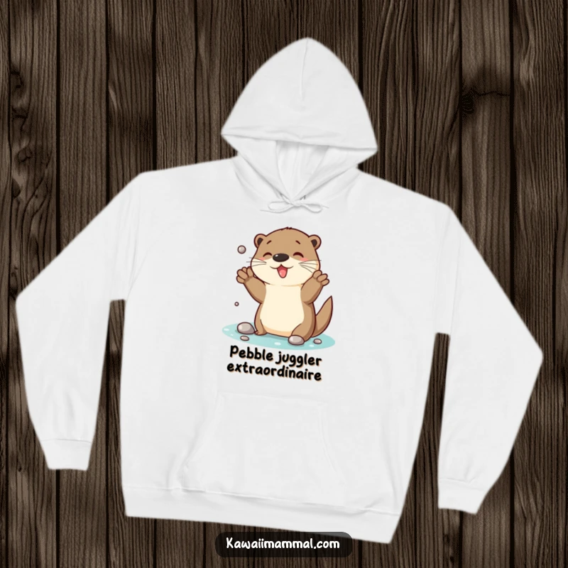 Funny Otter Hoodie: A spirited otter displays impressive juggling skills with shiny pebbles, radiating happiness and a playful vibe.