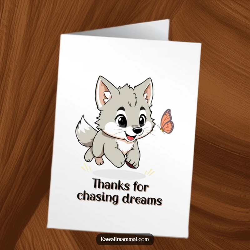 Funny Free Printable Thank You Card: A playful wolf puppy happily chases a butterfly, a downloadable card to say thanks.