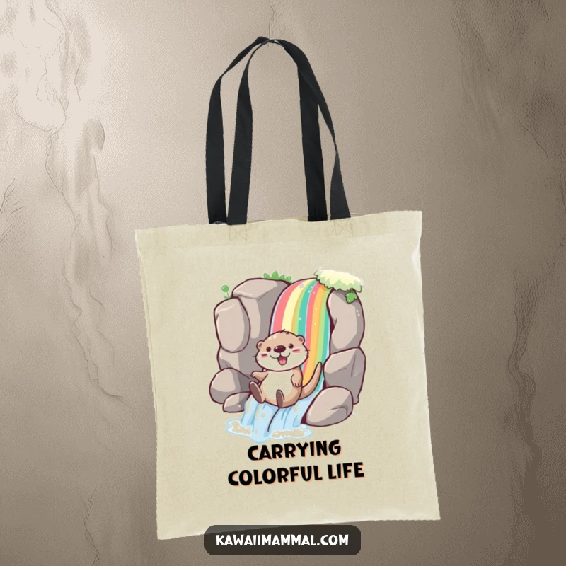 Funny otter tote bag showcasing a playful character joyfully sliding down a rainbow waterfall, perfect for carrying items with vibrant energy.
